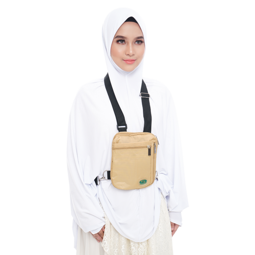 Beige Hajj and Umrah bag for women worn as a side bag
