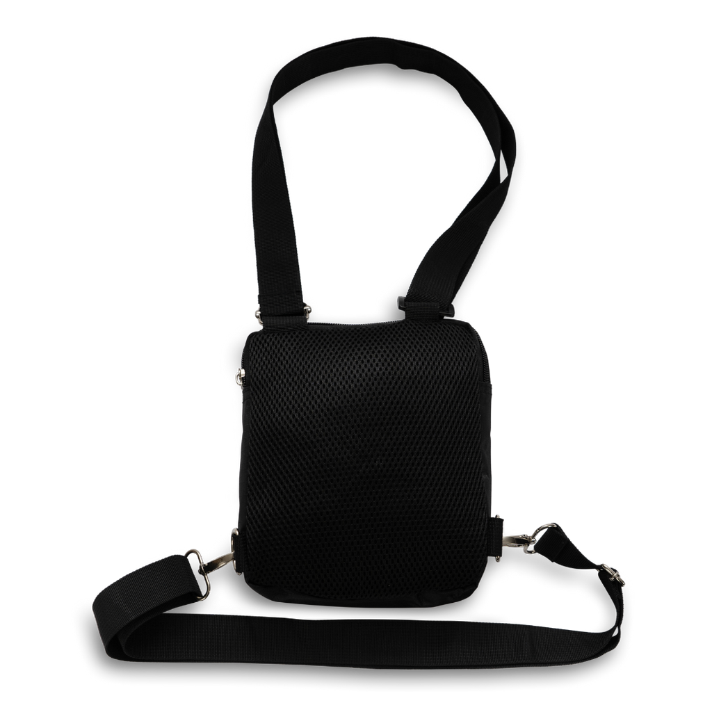 Female pilgrim wearing Hajj and Umrah bag during prayer (1)