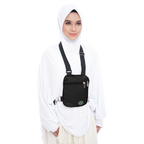 Black Hajj and Umrah bag for women worn as a side bag