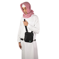 Black Hajj and Umrah bag for men worn as a side bag