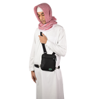 Black Hajj and Umrah bag for men worn as a side bag