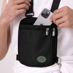 Men's black Hajj bag with secure compartments for phone and valuables